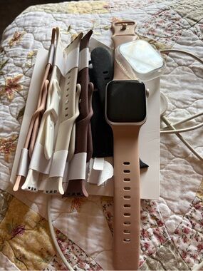 Apple Watch with Rose Pink Silicone Band and Extra Bands